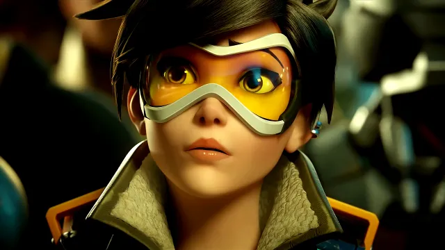 Tracer, une héroïne d'Overwatch, portant ses lunettes et sa veste emblématiques.